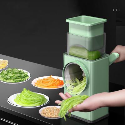 China Viable 4 in 1 Manual Tool Kitchen Multifunctional Vegetable Grater Radish Lemon Potato Roll Slicer for sale