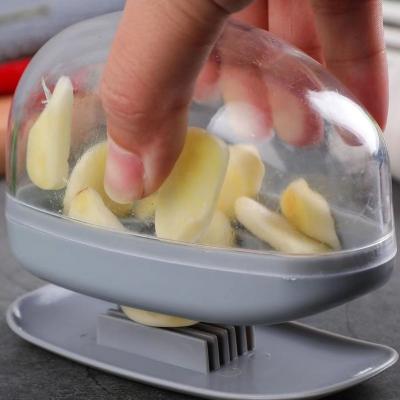 China Feature Multi-Functional Feature Multifunctional Hand Press Vegetable Container Food Cutter Garlic Cutter Slicing Oni for sale