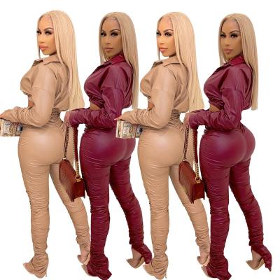 China 2021 Fashion PU Women Leather Two Piece Set Breathable Solid Color Pleated Tight Sexy Two Piece Suit for sale