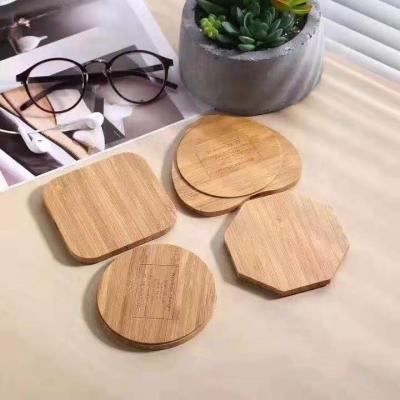 China Mobile Bamboo Desktop Qi Wireless Charger Heart Wooden Design Charge Bamboo Wireless Fast Charging Pad for sale