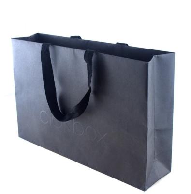 China Recycled Materials Printed Customer Logo Luxury Premium Shopping Tote Packaging Gift Paper Bag With Handle for sale