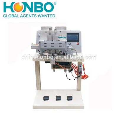 China HB-901CMultifunctional Claw Core Plastic Bead Automatic Double Head Four Bead Auger Automatic Crimping Machine 750*700*1180mm for sale