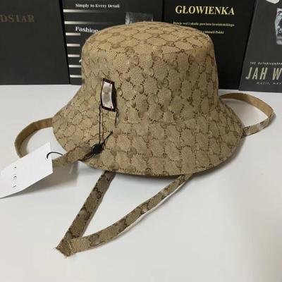 China Picture 2 Colors Summer Fashion Women Bilateral Letter Printing Fisherman Hat Summer Beach Sunshade UV Protection Hat for sale