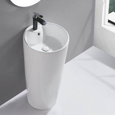 China Modern Classic Cylindrical One Piece Ceramic Wash Basin Bathroom Pedestal Sinks for sale