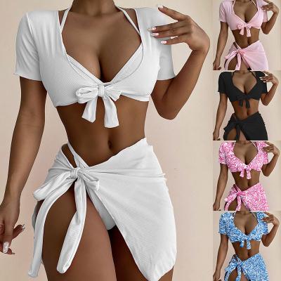 China Hot Selling High Quality Girls Antibacterial Youth Four Piece Halter Neck Tie Up Padded Bikini Set Beach Wear Swimwear With Cover Up Skirt for sale