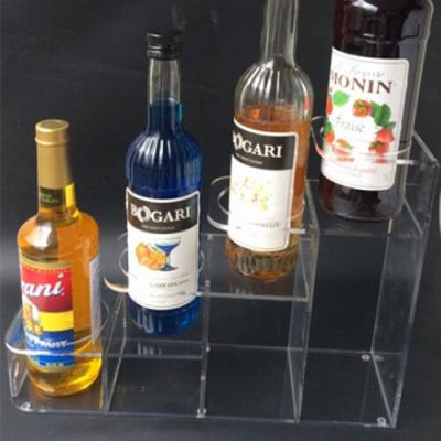 China Hot Selling Modern Customized Custom Acrylic Wine Display Stand Rack Wine Rack For Store for sale