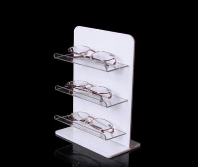 China Environmental Friendly 3 Tier Eyeglass Acrylic Display Stand Clear Sunglass Display Stand for sale