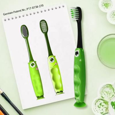 China Plastic & Green Rubber Soft Bristle Design Monster Cartoon Kids Plastic Toothbrush With BRC for sale