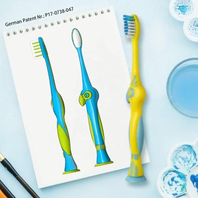 China Disposable German Design Attractive Animal Shaped Logo Custom Soft Bristle Plastic Kids Toothbrush With BRC CE for sale