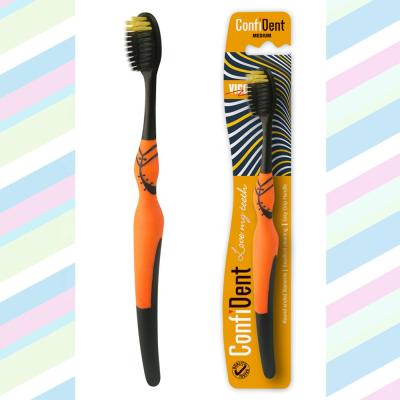 China Plastic & Cheap Organic Soft Black Charcoal Rubber Plastic Toothbrush With Custom Logo for sale