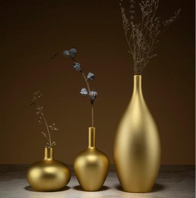 China China QIFU understated luxury golden copper vase for home decoration for sale