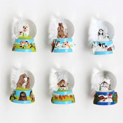 China Shape High Quality Custom Mini Magnet Snow Globe Resin Magnet Globe 3D Magnetic Snowball for sale