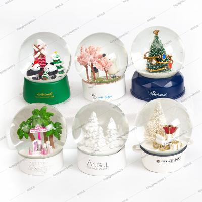 China Custom Different Style Business Gift Snow Globe Christmas Decoration Glass Snow Ball for sale