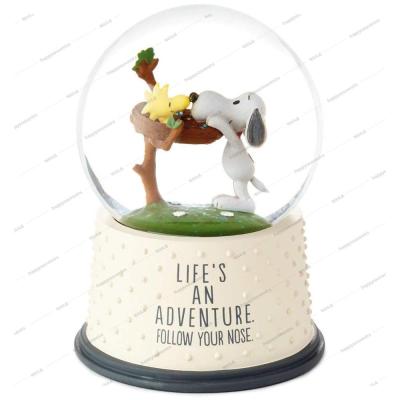 China Custom snoopy mini japan figure happiness glass snow globe birthday gift keepsake water globe snow ball for sale