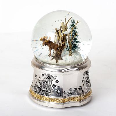 China China Christmas Tree Ornament Gold Deer Spinning Music Snow Globe Christmas Decor Metal Base Snow Ball for sale