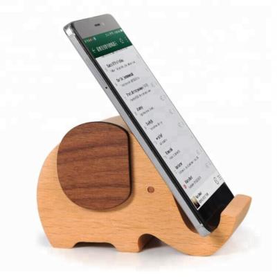 China Music box of the original 2020 environmentally friendly wooden products and wooden mobile phone holder gift for sale