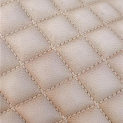 China Sustainable Custom Type Real Color Top Grain Lattice Stitch Cow Hide Leather Material For Car Seat And Sofa for sale