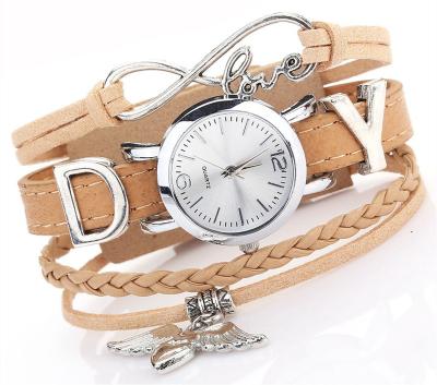 China Auto Date Woven Watch Fashion Bee Pendant Watch Casual Woven Belt Quartz Watch for sale