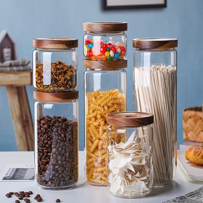 China Borosilicate Viable Transparent Round Storage Food Glass Jar With Acacia Wood Lid For Home 300ml 500ml 750ml 1000ml 1350ml 1550ml for sale