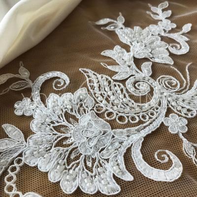 China 2021 Sustainable Luxury White Wedding Embroidery Lace Fabric F20008mn for sale