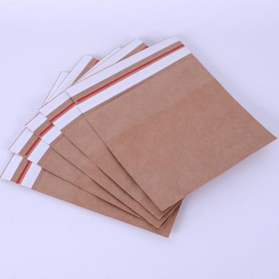 China Classic Self-seal Kraft Paper Bags Wholesale Price Clothing Large Capacity Kraft Paper Shipping Ads for sale