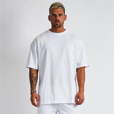 China Custom Cut Out Cotton Men's Custom Cut Out Fitness Fit QUICK DRY Dry ​​White Workout Gym Wear Men's T-Shirt for sale