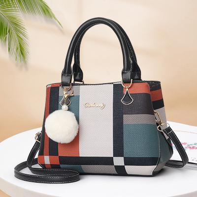 China 2022 Fashion Color Grid Multifunctional Woman Bags Toss Shoulder Bag Women Handbags With Fur Ball Decoration for sale