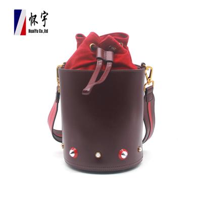 China Newest 2022 Summer Trendy Fashion Lace Up Solid PU Leather Bucket Bag Large Teenage Girl Handbags for sale