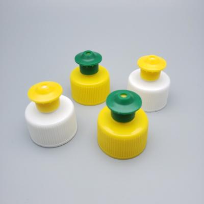 China Non Spill PP Ribbed Soft Plastic Disc Cap Screw Cap Flip Top Cap for sale