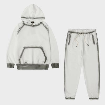 China Breathable Streetwear Paint Splatter Sweat Suits Plain Spray Painted Jogger Oversized Suits For Kids for sale