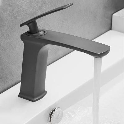 China Modern Black Basin Faucet Single Handle Bathroom Sink Mixer Deck Mounted Hot And Cold Water Sink Faucet for sale