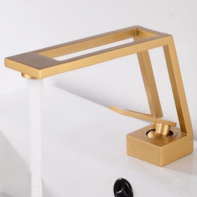 China Hot Water Tap Basin Vanity Sink Faucet Handle Gold Bathroom Mixer Cold Modern Simple Deck Mounted Sink Faucet for sale