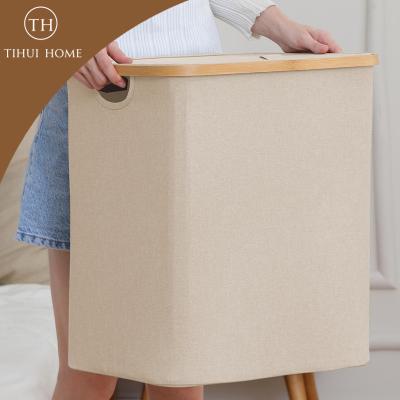 China Tihui homeWaterproof Corner Home Laundry Basket Folding Round Storage Bamboo Laundry Basket For Dirty Clothes for sale