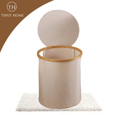 China Tihui homeWaterproof Corner Home Laundry Basket Folding Round Storage Bamboo Laundry Basket For Dirty Clothes for sale