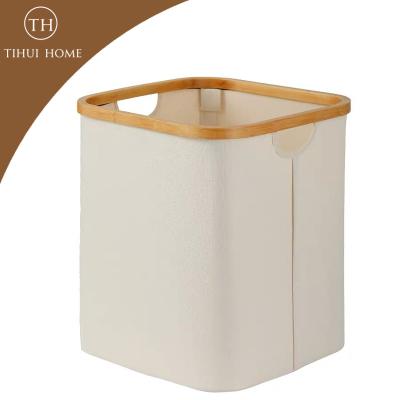 China Tihuihome Home Made in China Blue Beige Fabric Storage Hamper Lined Dirty Clothes Laundry Hamper with Bamboo Handle for sale