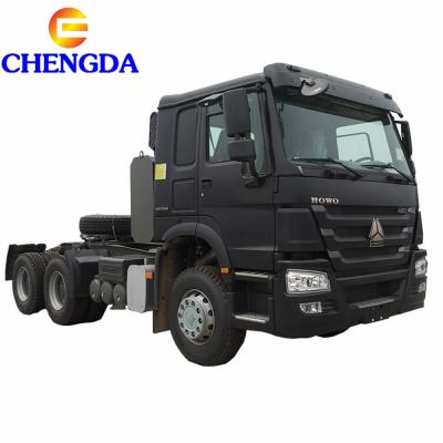 China 40 Ton Tractor Head HOWO Trailer Used Truck Tractor 40 Ton Tractor Truck Extra Enlarged Oil Tank 6800*2496*2958 for sale