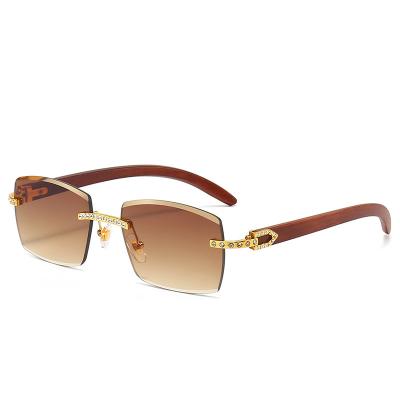 China Fashion sunglasses brand 2023 unisex men's unisex wood grain sunglasses fashion personality design rimless cut glasses glasses with diamonds for sale