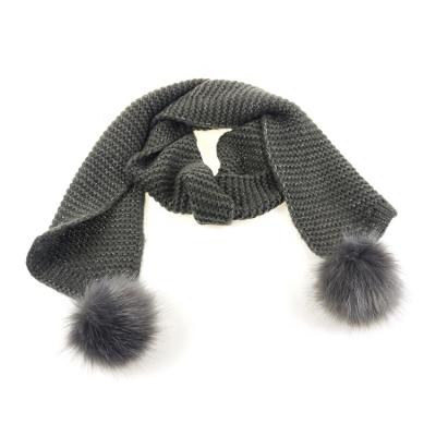 China Thick cute long design knit winter scarf with fur pom pom for girls for sale