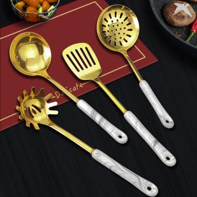 China Gold Plated Stocked Household Kitchen Turner Stainless Steel Kitchen Utensils And Soup Ladle Set Cooking Tools Ceramic Handle for sale