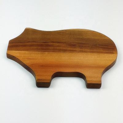 China Acacia Pig Shape Reversible Wood Animal Reversible Wooden Pig Shaped Cutting Board Acacia Wood Serving Board for sale