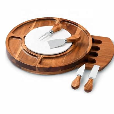 China Workable 6pcs set round shape acacia wood cheese board with cheese knife cheese board and knife set made of acacia wood for sale