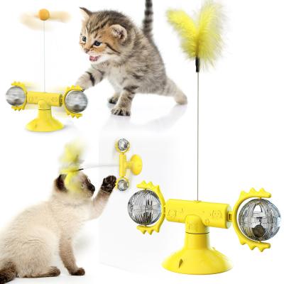 China Interactive Teasing Happy Turntable Eco-Friendly Viable Cat Spring Ball Toy Pet Puzzle Feather Funny Head for sale