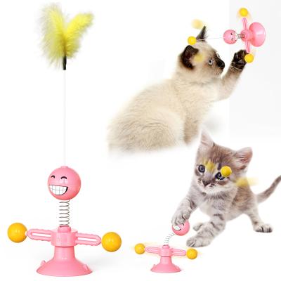 China Sustainable Eco-Friendly Interactive Teasing Happy Turntable Cat Spring Ball Toy Replaceable Head Funny Pet Puzzle Feather for sale