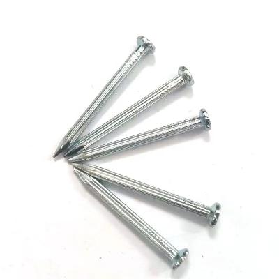 China Clavos de hormigón de acero con raíces con ranuras Fijación de clavos de pared de hormigón galvanizado en venta