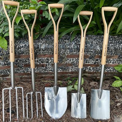 China Garden Shovel Household flower planting loose soil gardening shovel wood handle stainless steel head rake spade shovel gardening hand tools for sale