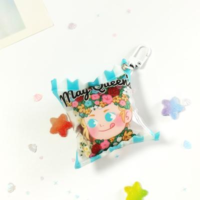 China Custom Printed High Quality Acrylic Gift Candy Bag Key Chain Charms With Moving Shiny Sequins for sale