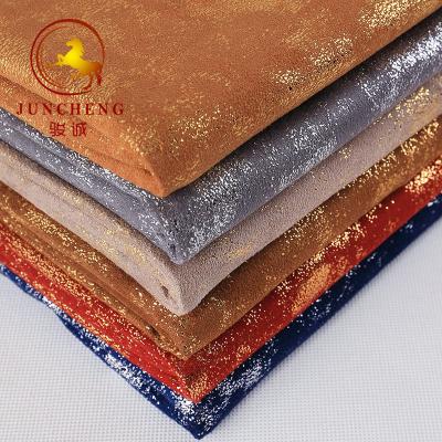 China Good quality luxurious Bronzing Suede Fabric for Garment à venda