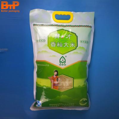 China Barrier Around Strong Plastic Rice Bag Vacuum Handle Thick Materials Packaging Food Pouch Maker for sale