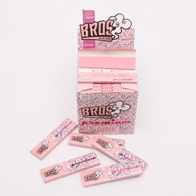 China Custom Your Logo Bros Pink With Tips 33L 110*44MM Rolling Paper Smoking Accessories OEM for sale