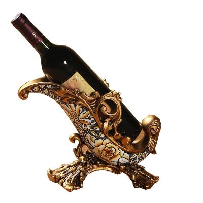 China Art Decor European and American Antique Resin Red Wine Rack KTV Bar Wine Bracket Home Living Room Decoration Crafts for sale